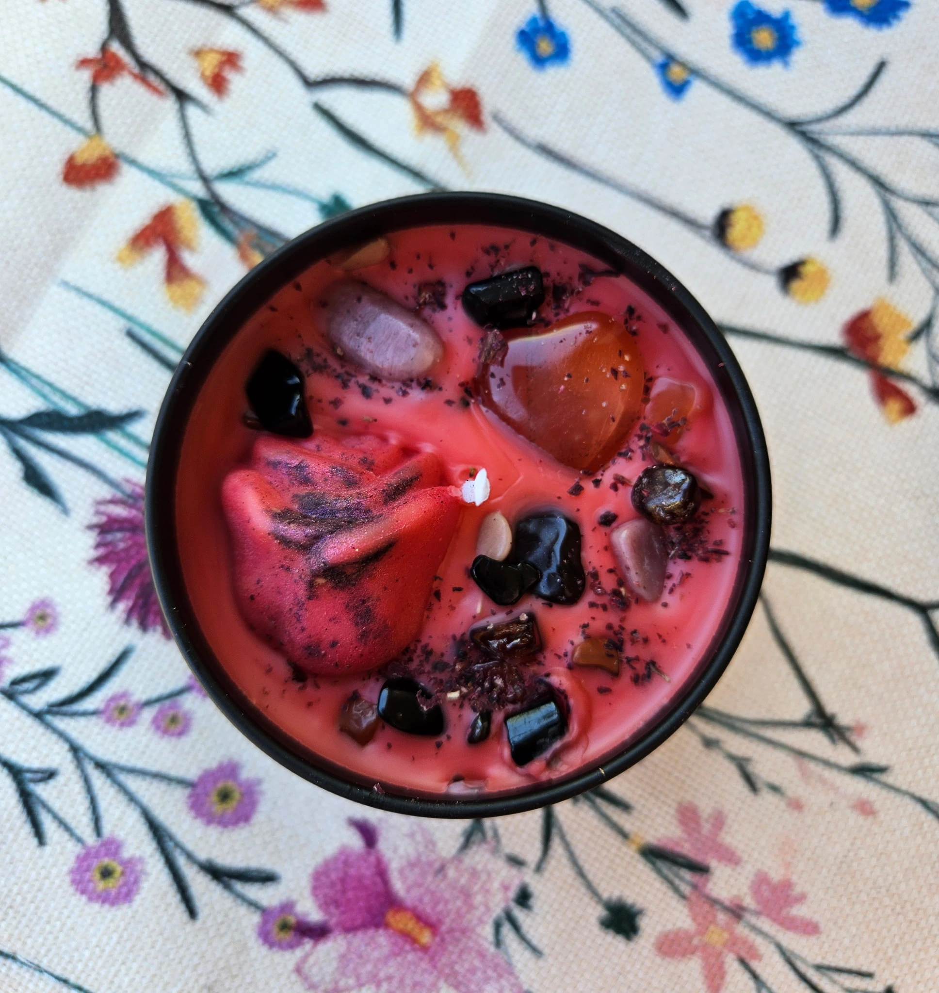 herb infused candle with a topside view